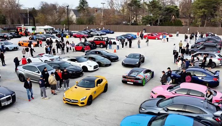 Rows of cars parked at the Red Devils Garage charity meet